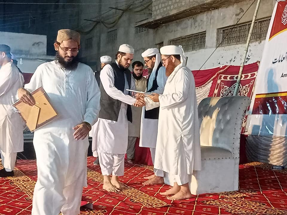 Two people holding hands